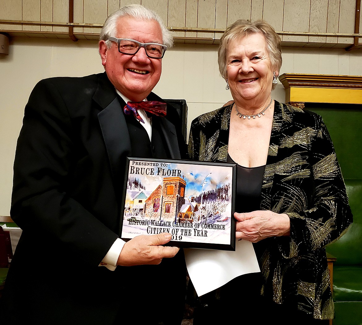 Janet Feiler (right) presents the Historic Wallace Chamber Citizen of the Year award to Bruce Flohr.