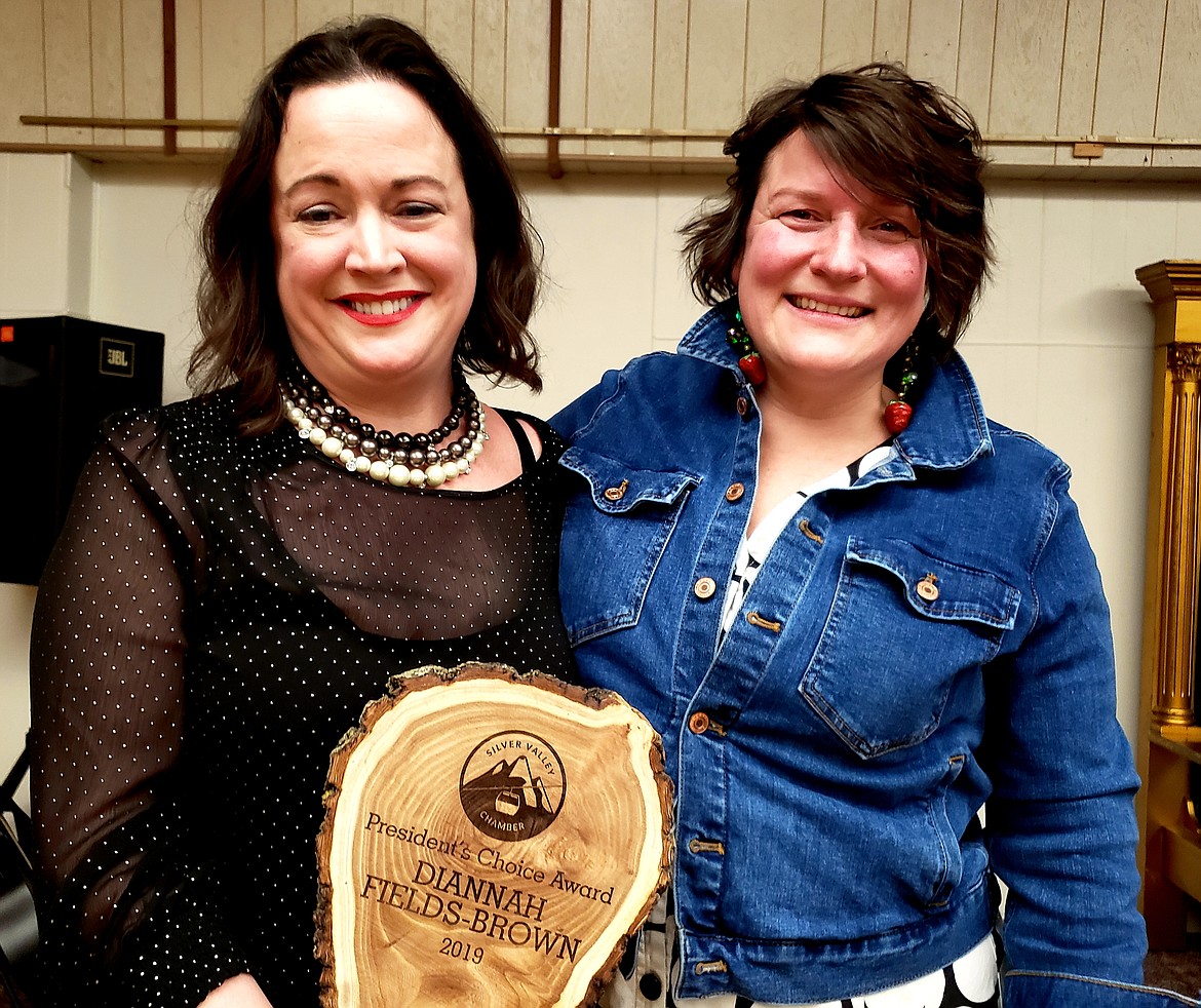 SVCC Past president Sarah Murphy (right) presents the Silver Valley Chamber President&#146;s Choice Award to 1st VP Diannah Fields-Brown.