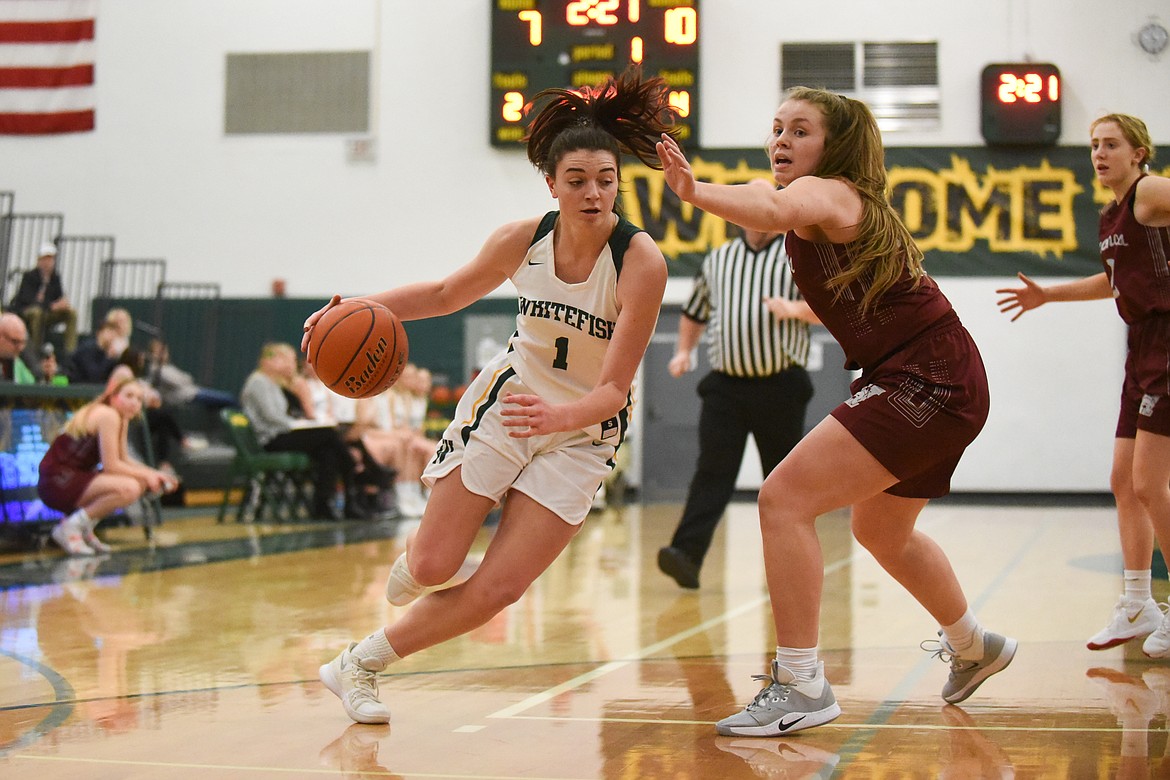 Jadi Walburn attacks the lane during Saturday&#146;s home loss to Hamilton. (Daniel McKay/Whitefish Pilot)