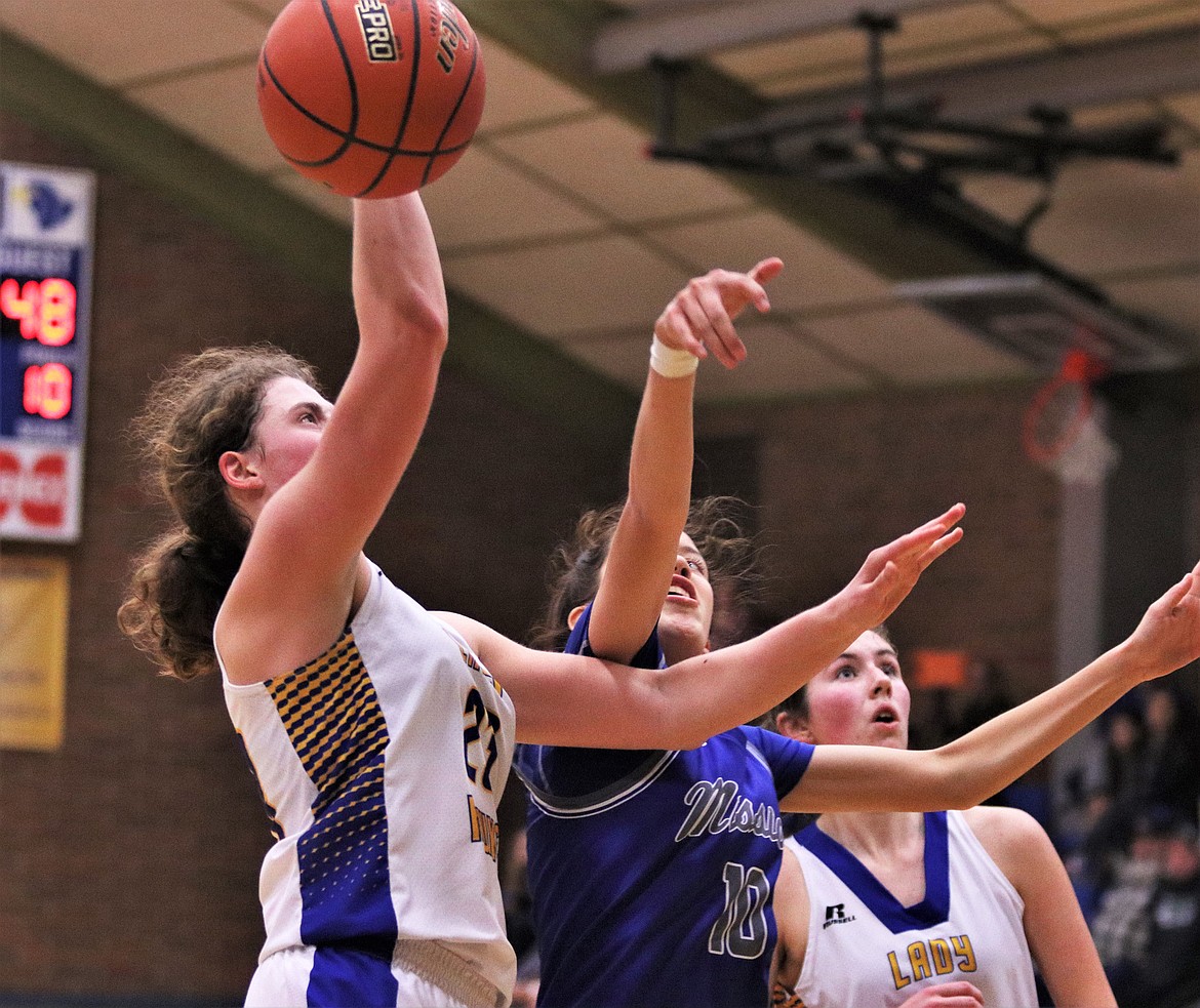 A SHOT by Jody Detlaff blocked by Mission&#146;s defense. (John Dowd/Clark Fork Valley Press)