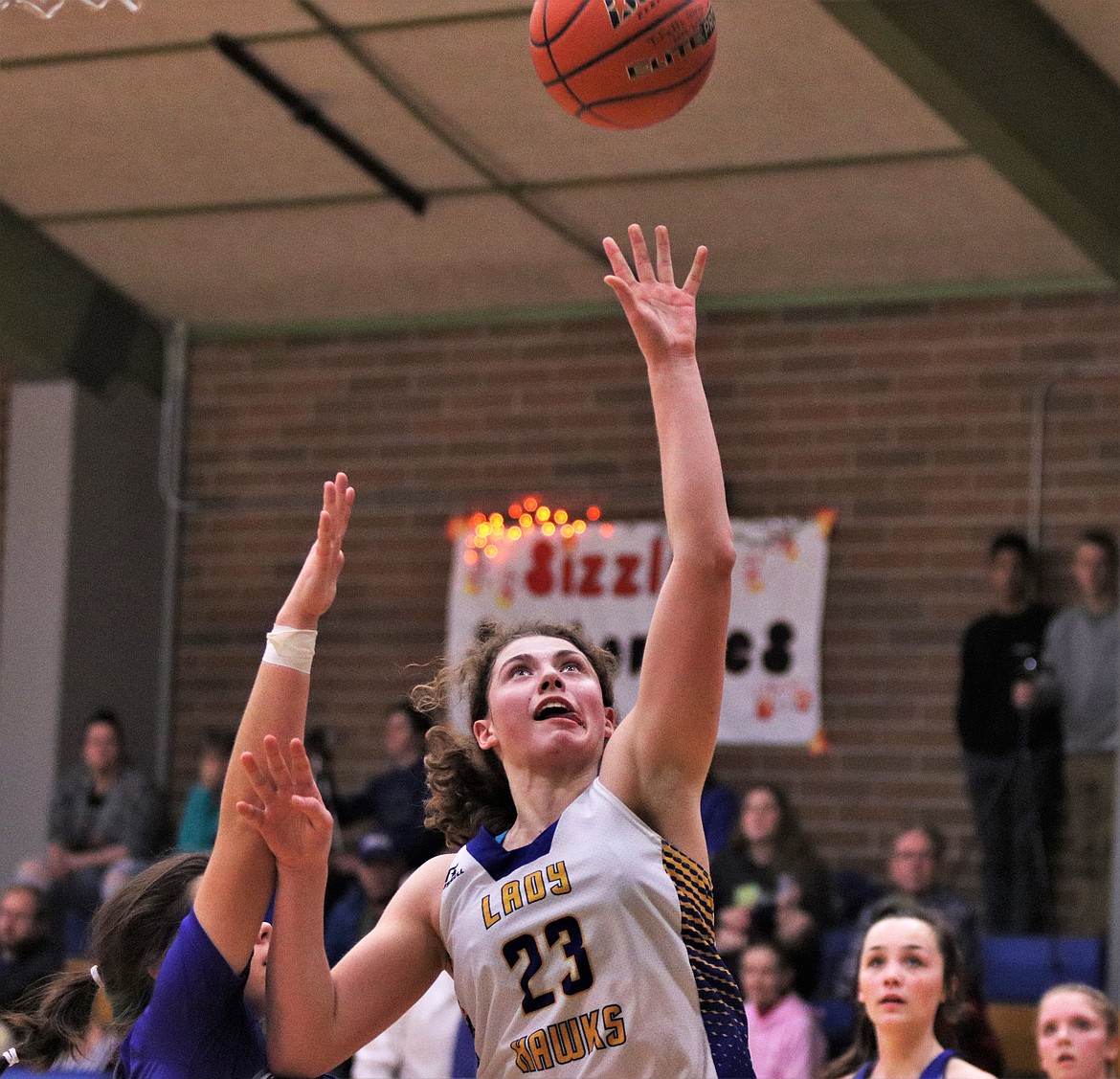 JODY DETLAFF (23) scores for Thompson Falls last Thursday against visiting Mission. (John Dowd/Clark Fork Valley Press)