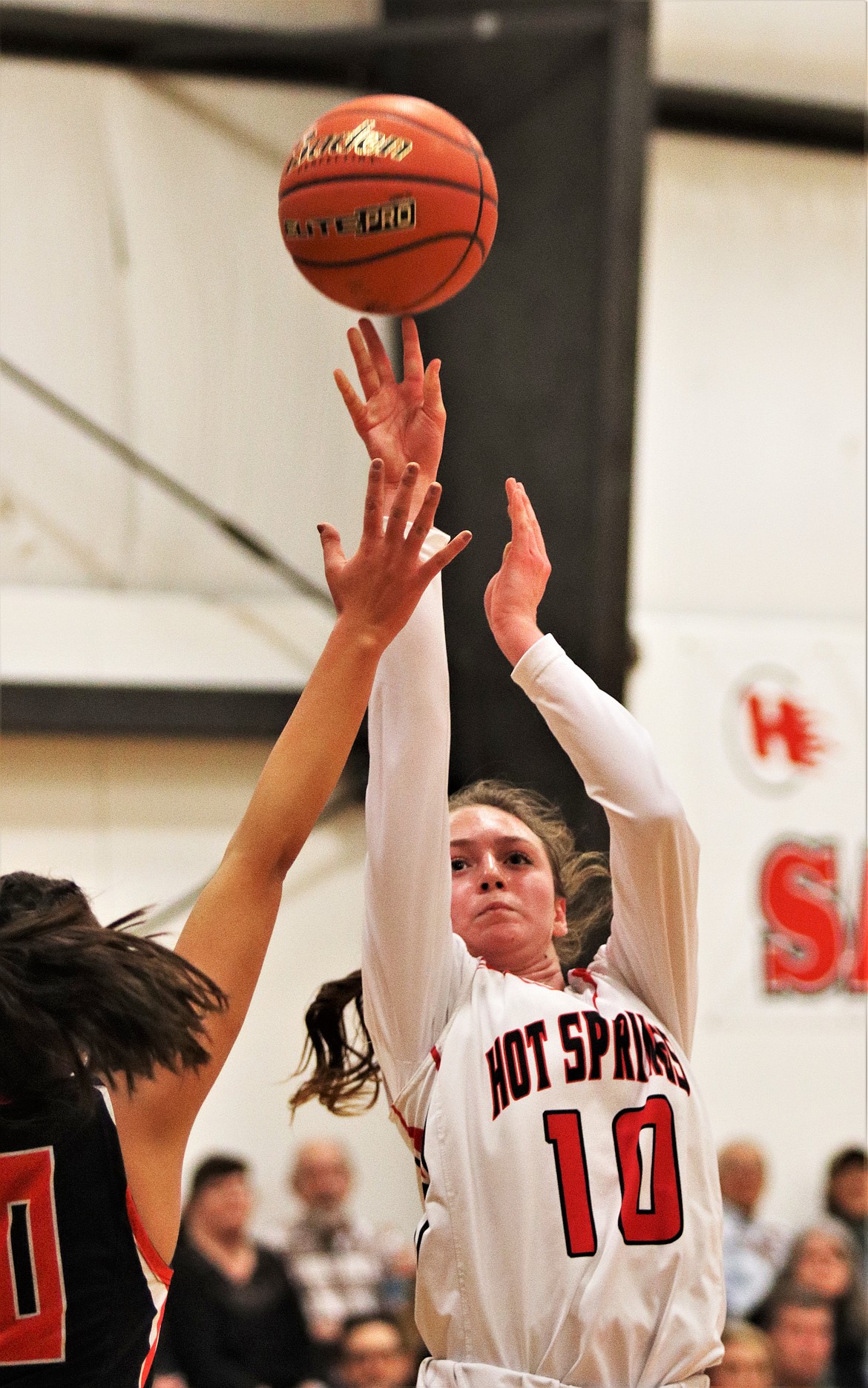 KATELYN CHRISTENSEN shooting to score for Hot Springs, last Frday, during their game against Plains. (John Dowd/Clark Fork Valley Press)