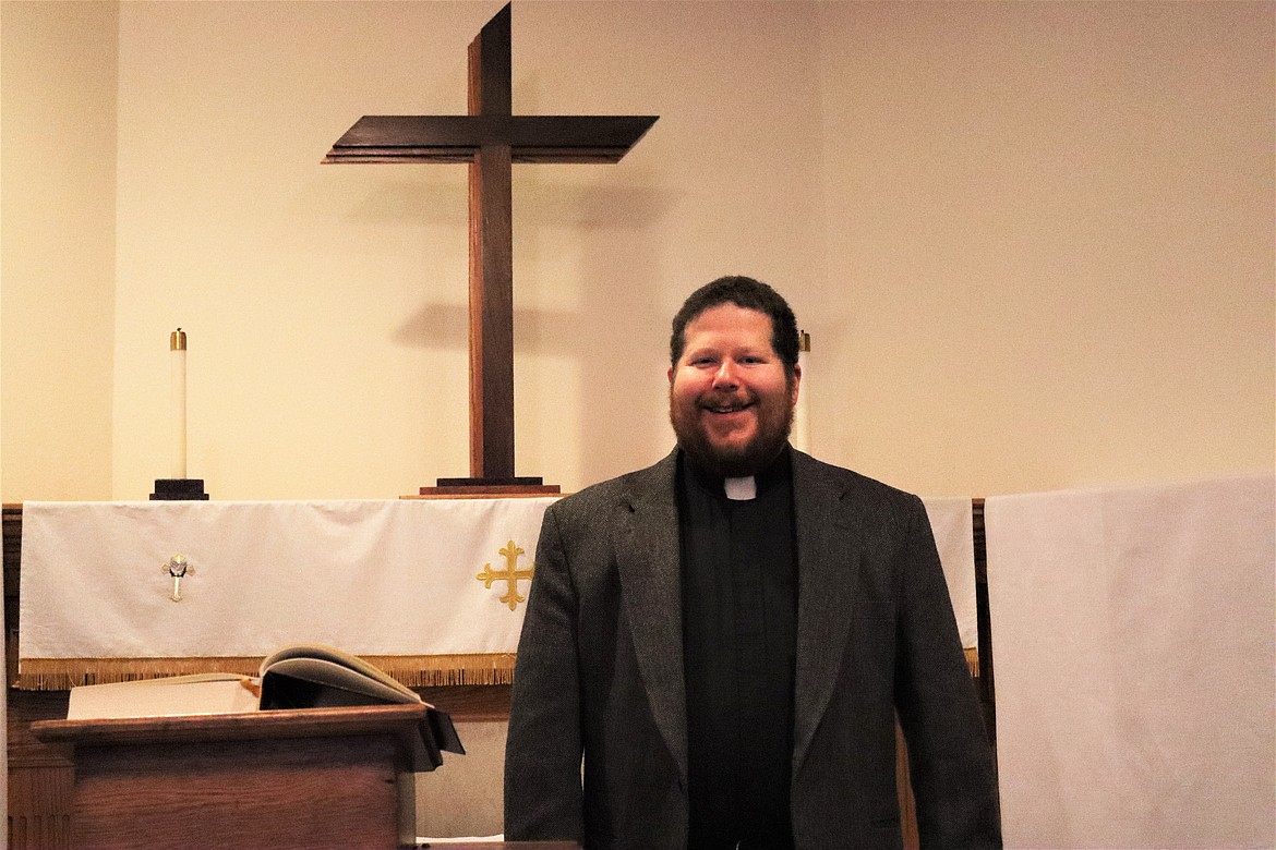 PASTOR JAKOB Berger standing in the Shepard of the Valley Lutheran Church in Thompson Falls. (John Dowd/Clark Fork Valley Press)