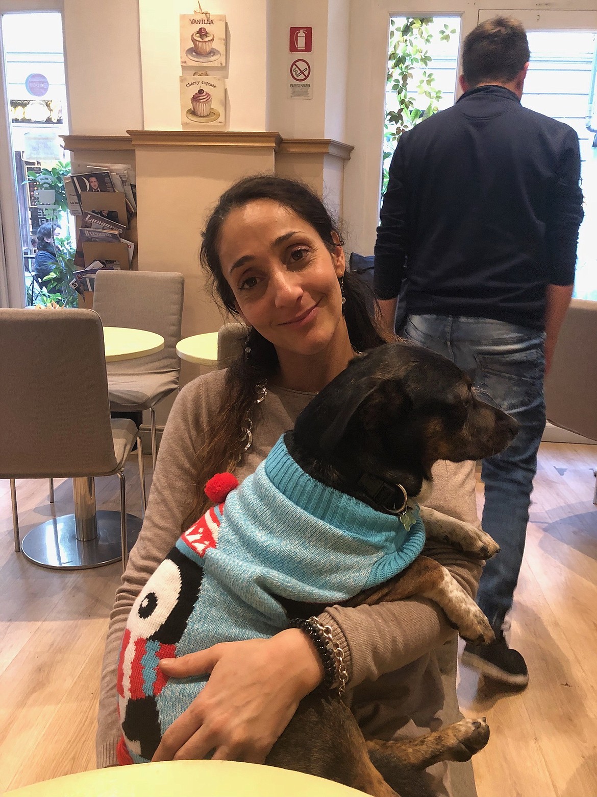 Caffe Dolce Amaro owner Francesca Battisti and her dog, Cookie. ELENA JOHNSON/Photo