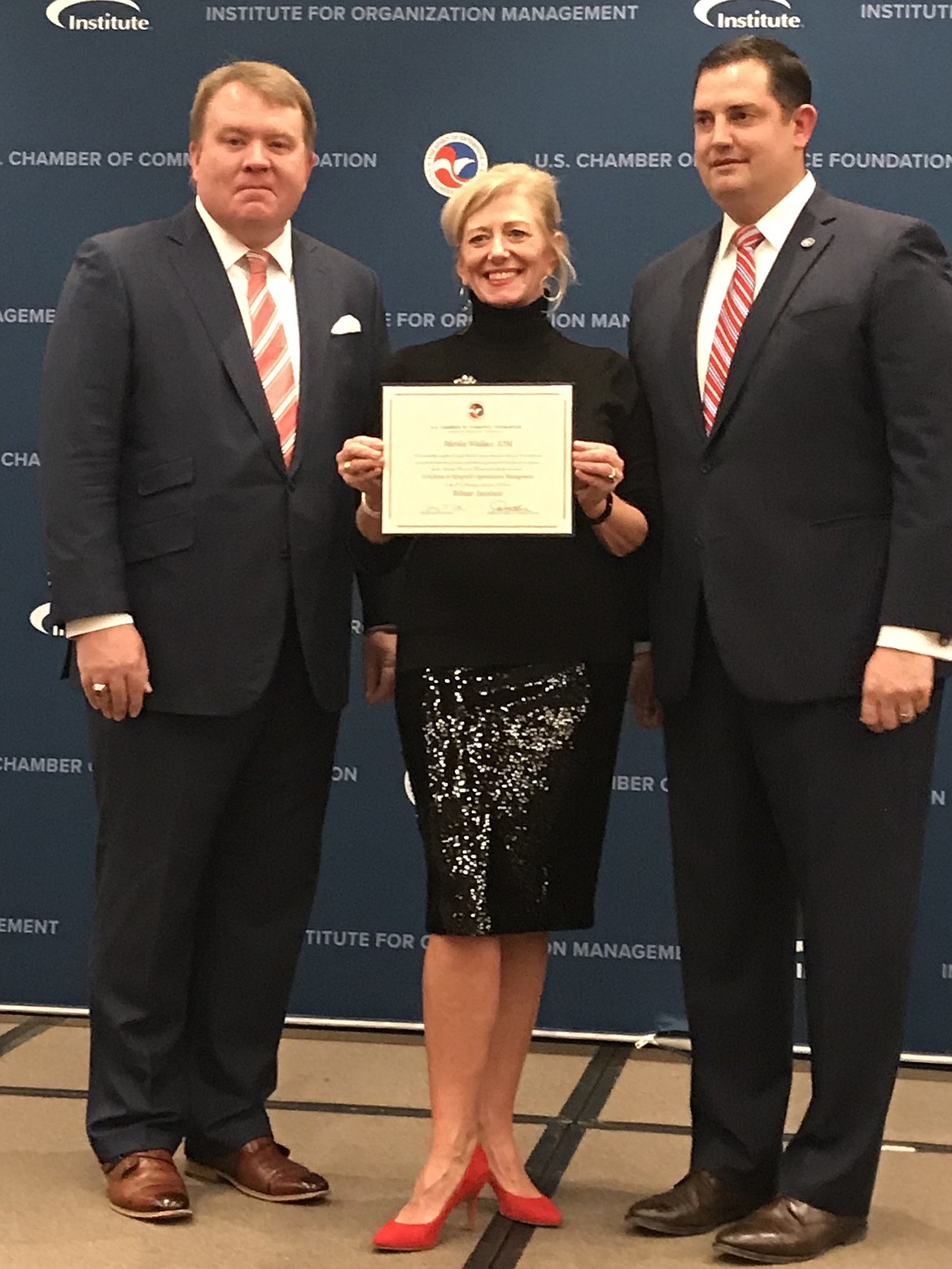 COURTESY PHOTO
Marilee Wallace is flanked by Jeremy Arthur, Chair National Board of Trustees, Institute of&#160;Organization Management, and Thomas Donohue, CEO U.S Chamber of Commerce.