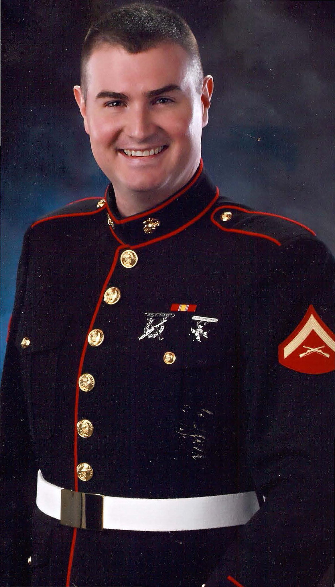 Courtesy photo
Dustin Frantz sidestepped death on the battlefield and fought through a deadly pancreatitis to see his seventh child born Monday in Kootenai Health, where Frantz has been hospitalized for months. Frantz is seen here in his Marine uniform.