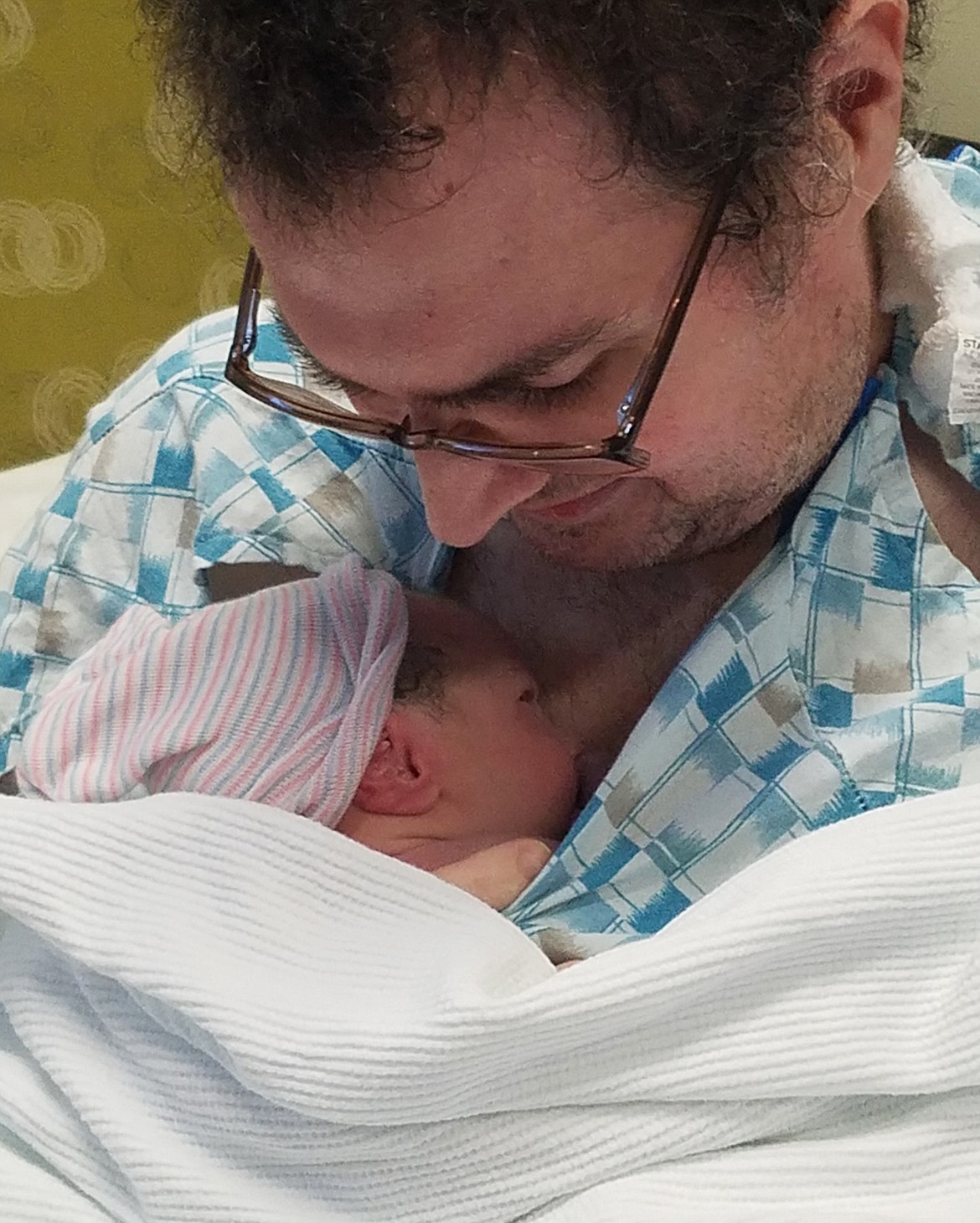 Dustin Frantz bonds with his newborn boy Samuel Frantz right after his birth Monday afternoon. Dustin, who has been hospitalized at Kootenai Health for months, is extremely grateful he was able to be present for his baby's birth. (Courtesy photo)