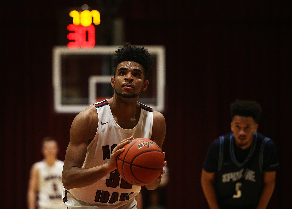 North Idaho College guard Jaden Dewar eyes the basket as he shoots a free throw against Community Colleges of Spokane.