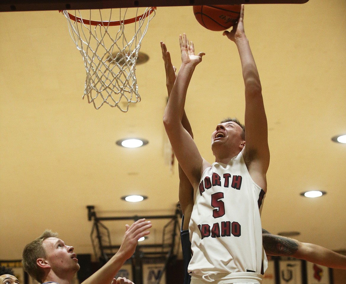 North Idaho College&#146;s James Carlson scores a layup against Community Colleges of Spokane.