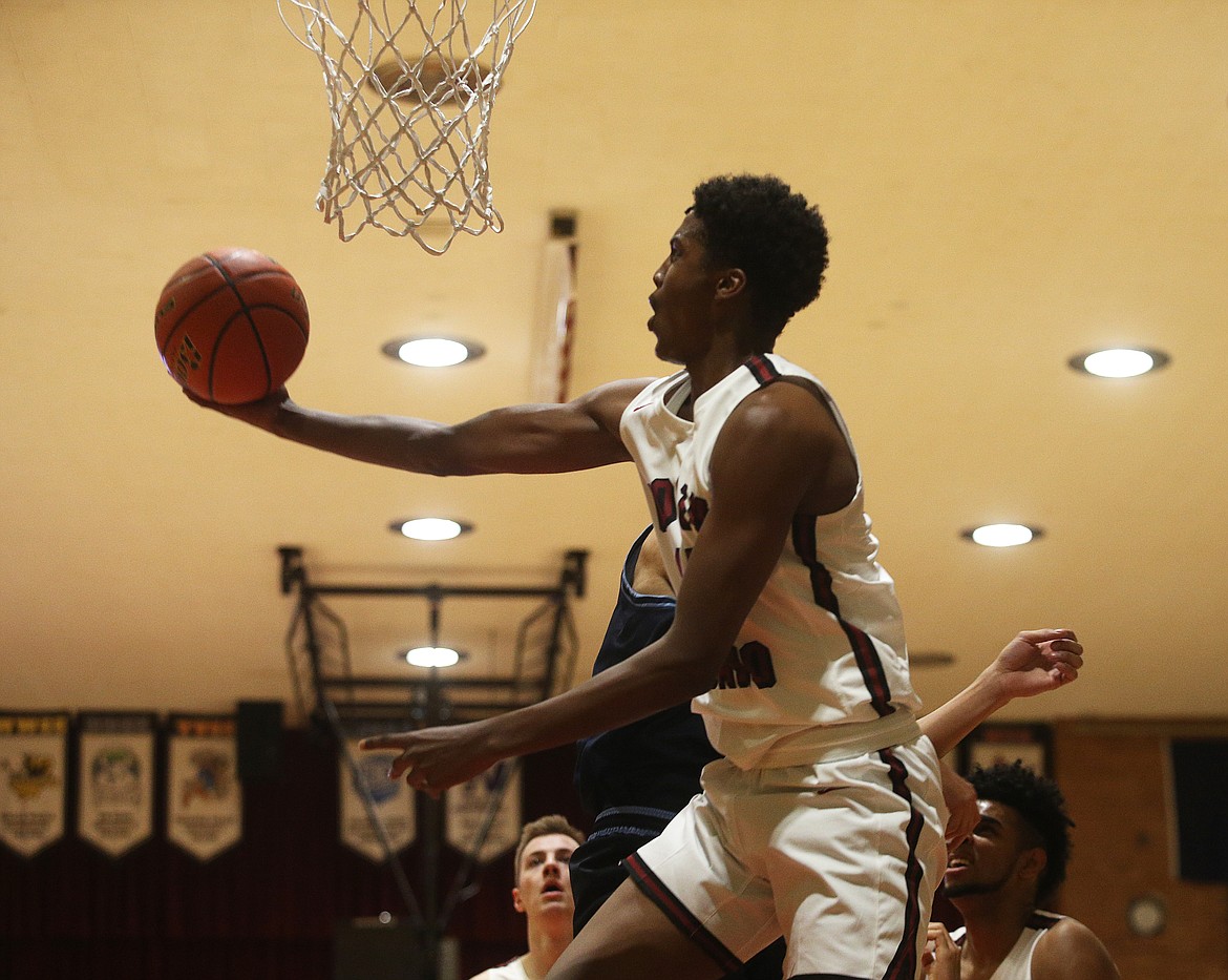 North Idaho College&#146;s Yusuf Mohamed scores on a layup in Wednesday night&#146;s game against Community Colleges of Spokane.