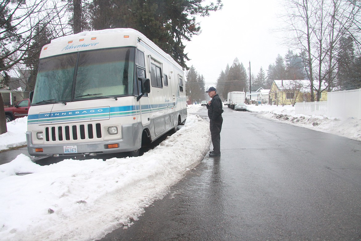 RALPH BARTHOLDT/Press
Terry Drube, a COP volunteer, talks on his radio with an animal control officer about a cat that lives in an abandoned Winnebago near East Sherman Avenue. The police department wants to get the RV off the street because it&#146;s a hazard, but it can&#146;t be towed with an animal inside.