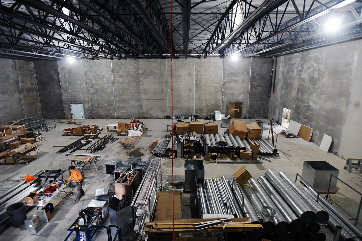 Shown is the future gymnasium which also currently serves as a staging area for materials at Somers Middle School on Wednesday, Jan. 22. A divider curtain will be installed to allow school staff to split the future competition-sized basketball court into two. (Casey Kreider/Daily Inter Lake)