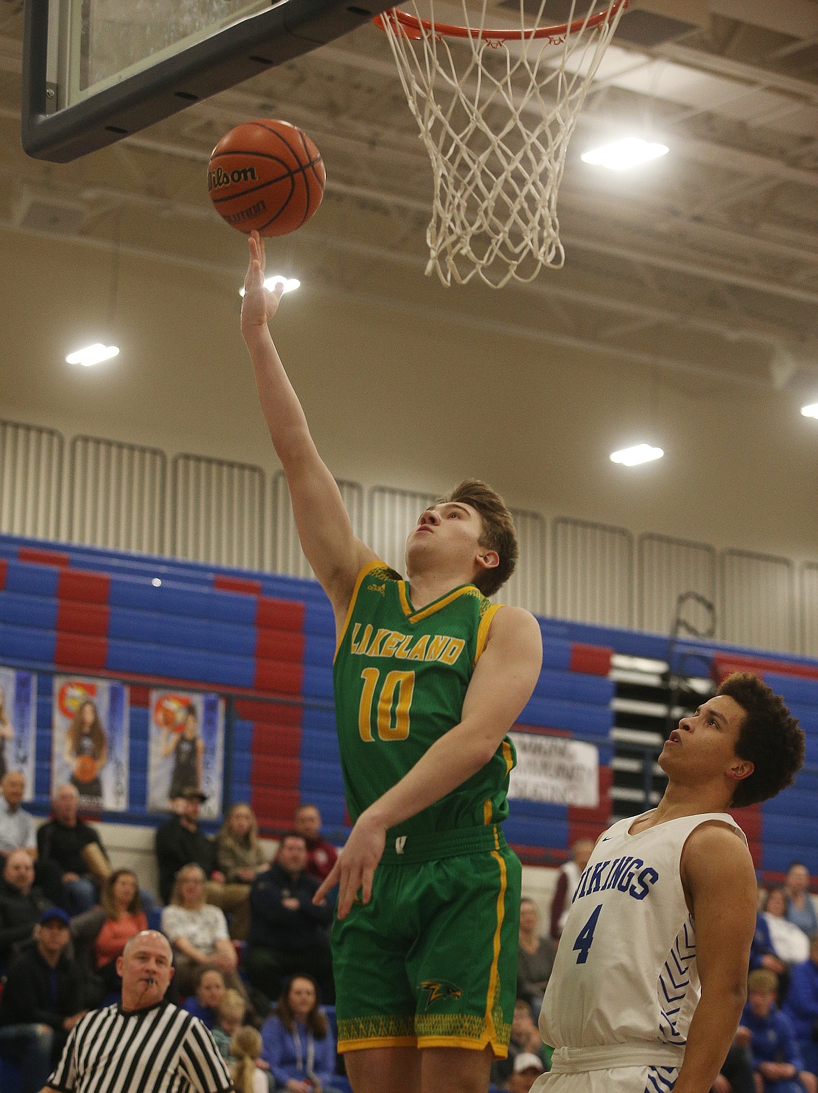 Lakeland Highs Carson Seay drives toward the basket for the score against Coeur dAlene. (LOREN BENOIT/Press)