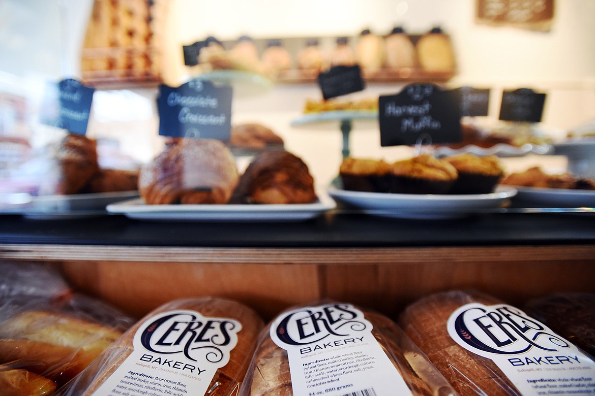 Breads and pastries are showcased in one of the bakery&#146;s new display areas.