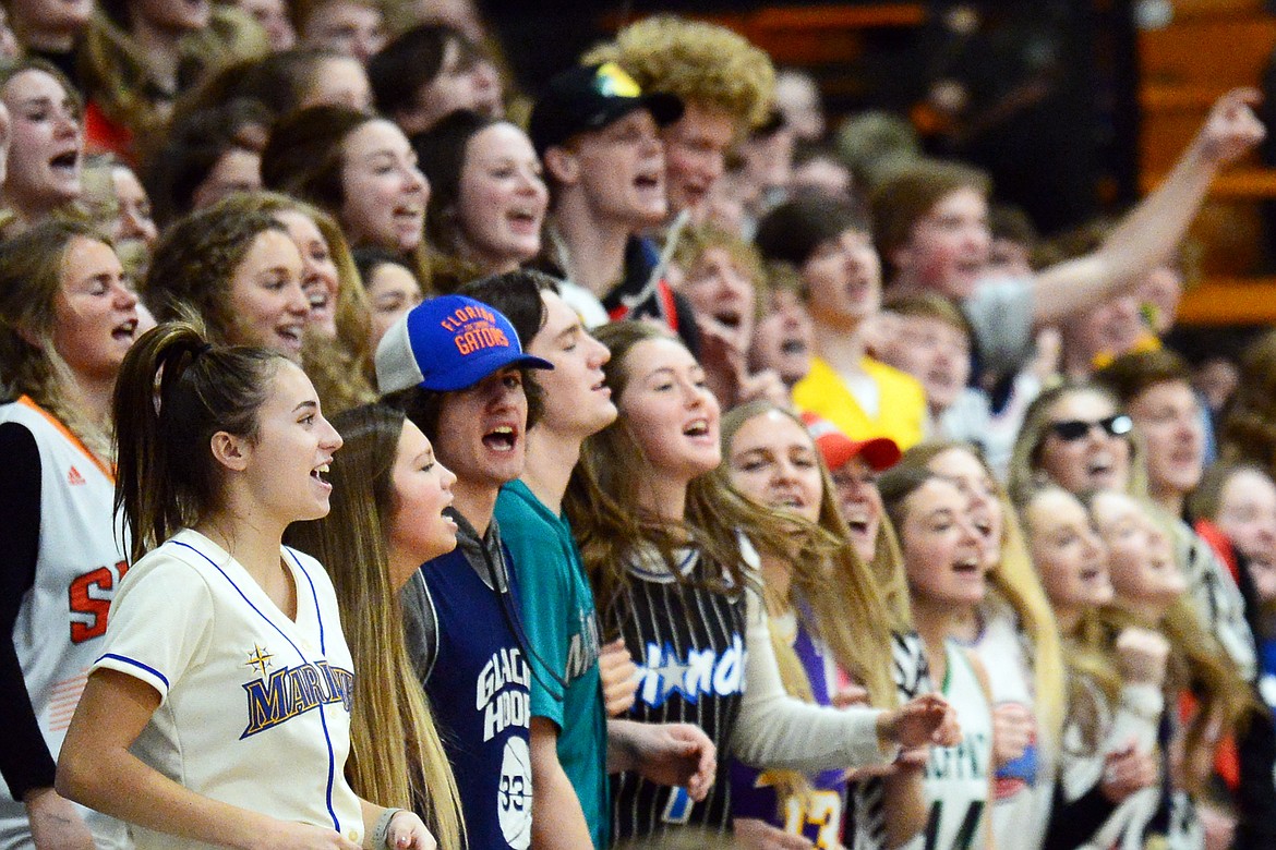 The Glacier student section cheers on the Wolfpack during a crosstown matchup with Flathead at Flathead High School on Thursday. (Casey Kreider/Daily Inter Lake)