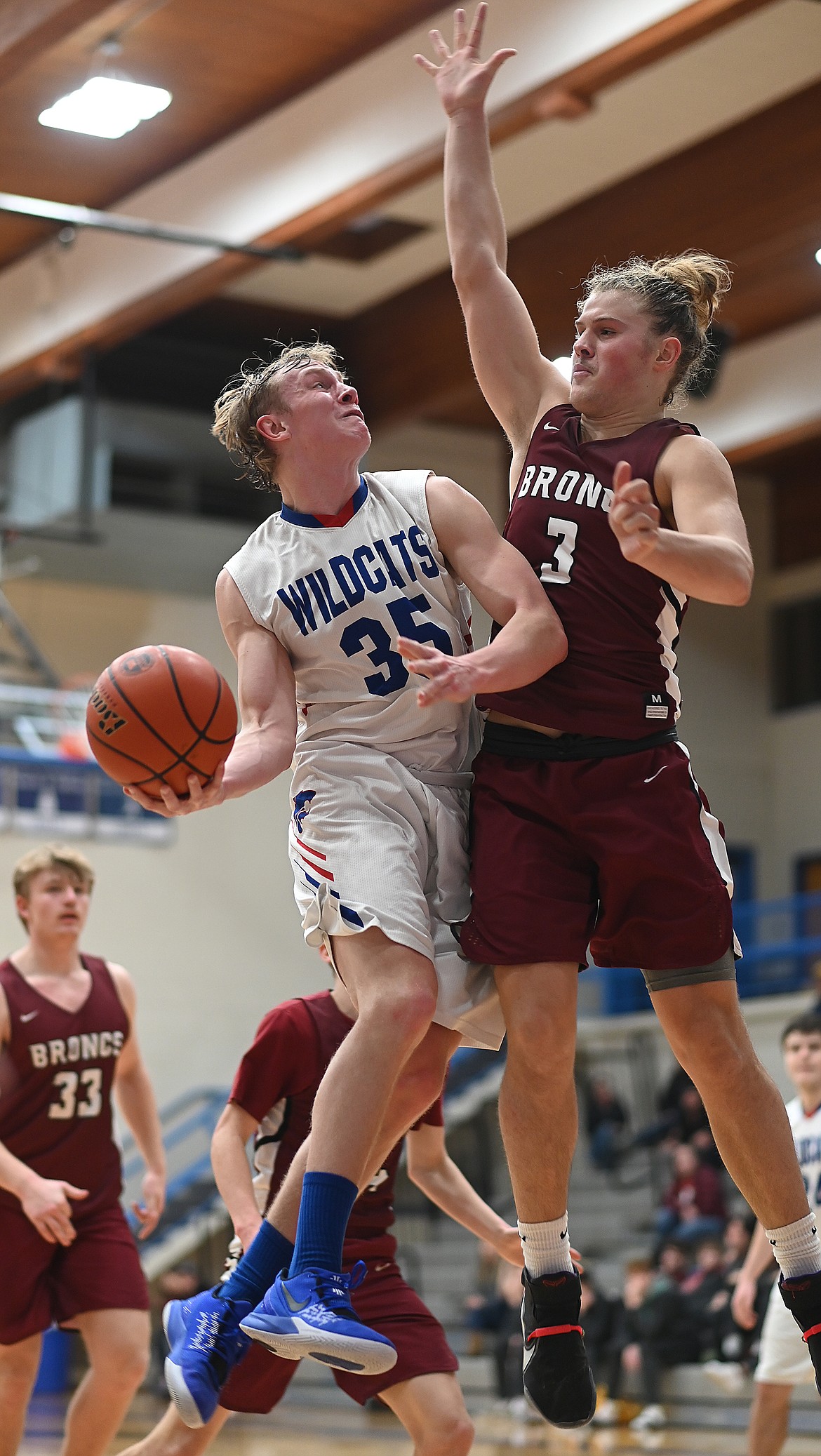 Allec Knapton goes to the basket Saturday against Hamilton. (Chris Peterson photo)