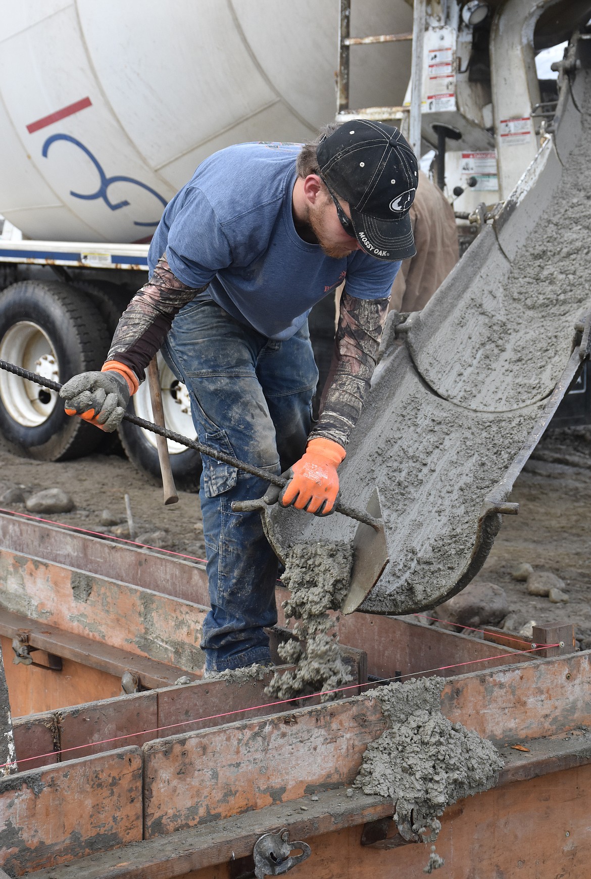 Workers build a foundation on Mineral Avenue. (Duncan Adams/The Western News)