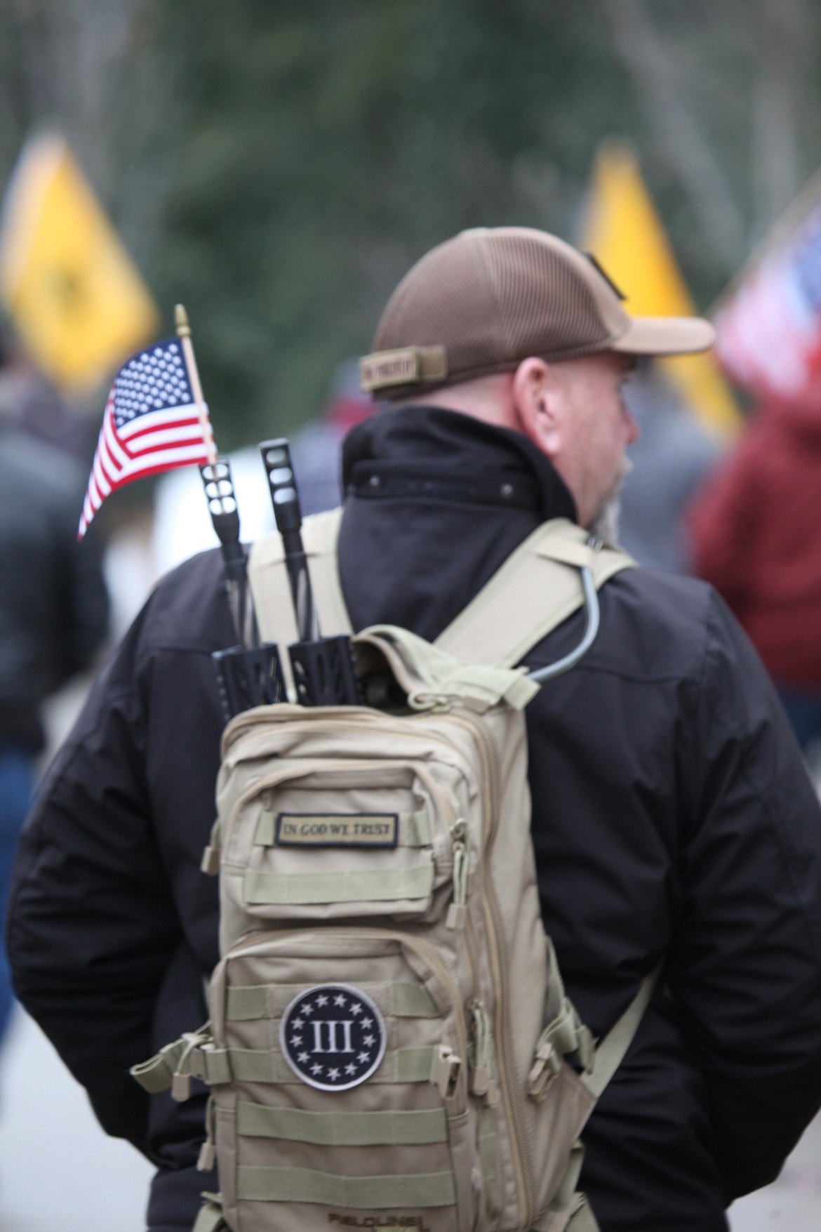 A man walks on the sidewalk between The Resort Shops and the parking garage on the way to McEuen Park, where the Second Amendment Rally in support of Virginia Second Amendment rights was held Monday. (DUANE RASMUSSEN/Special to The Press)