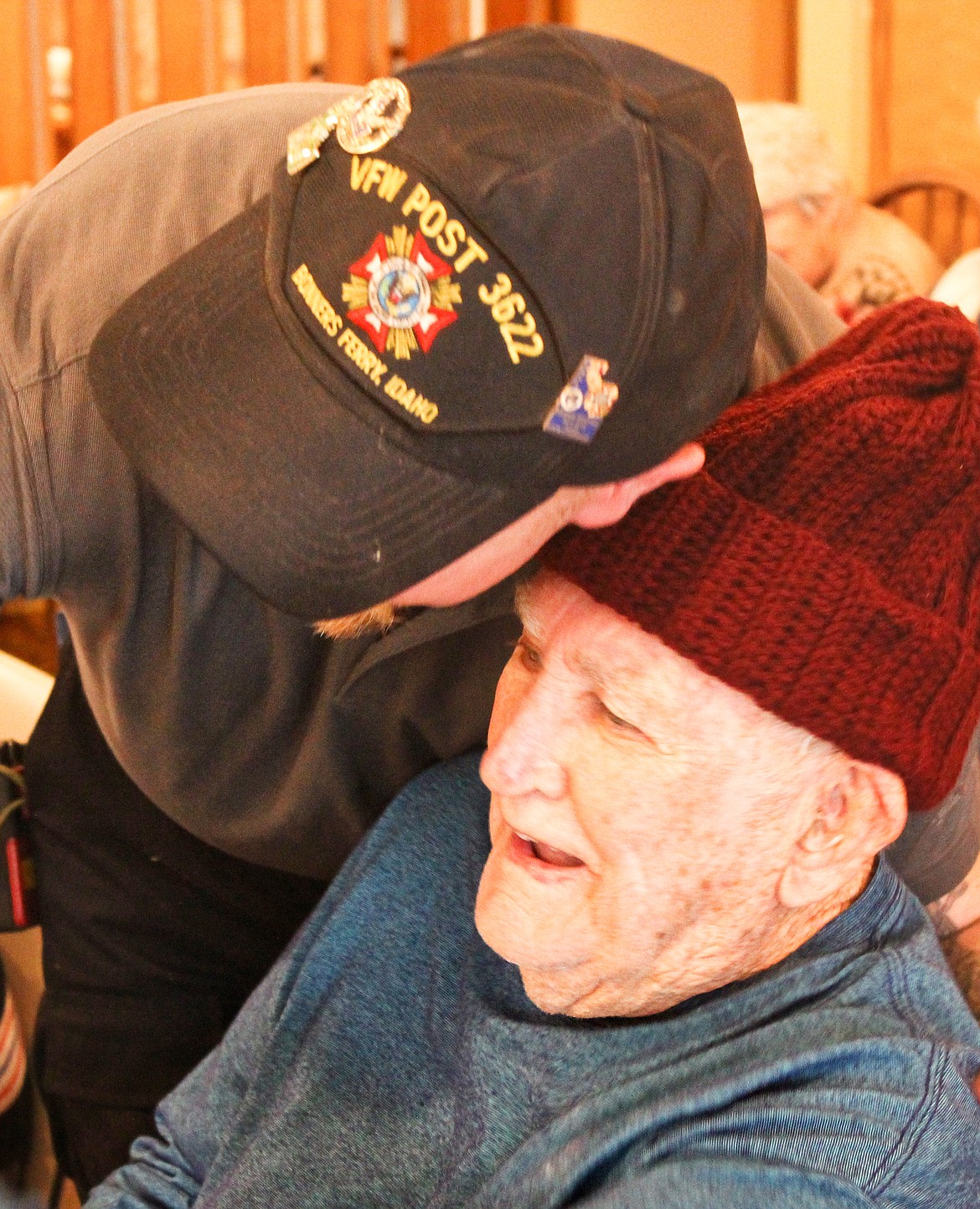 Photo by TONIA BROOKS
Tom Cheney, after handing out warm blankets and handmade knitted hats to Restorium former first responders and military veterans, supplied the attendees with warm hugs.