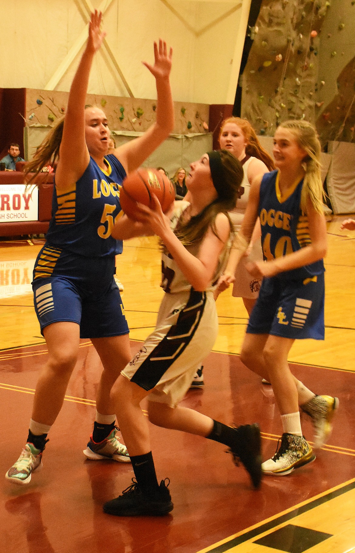 Troy&#146;s Jayden Leighty tries to break free of the Libby Lady Loggers&#146; defense during a 48-14 loss Jan. 21. (Duncan Adams/The Western News)