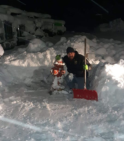 Courtesy photos/
James Borg poses with a hydrant he recently cleared away on Polaris Ave. in Osburn. Borg was one of the first to enter the contest.