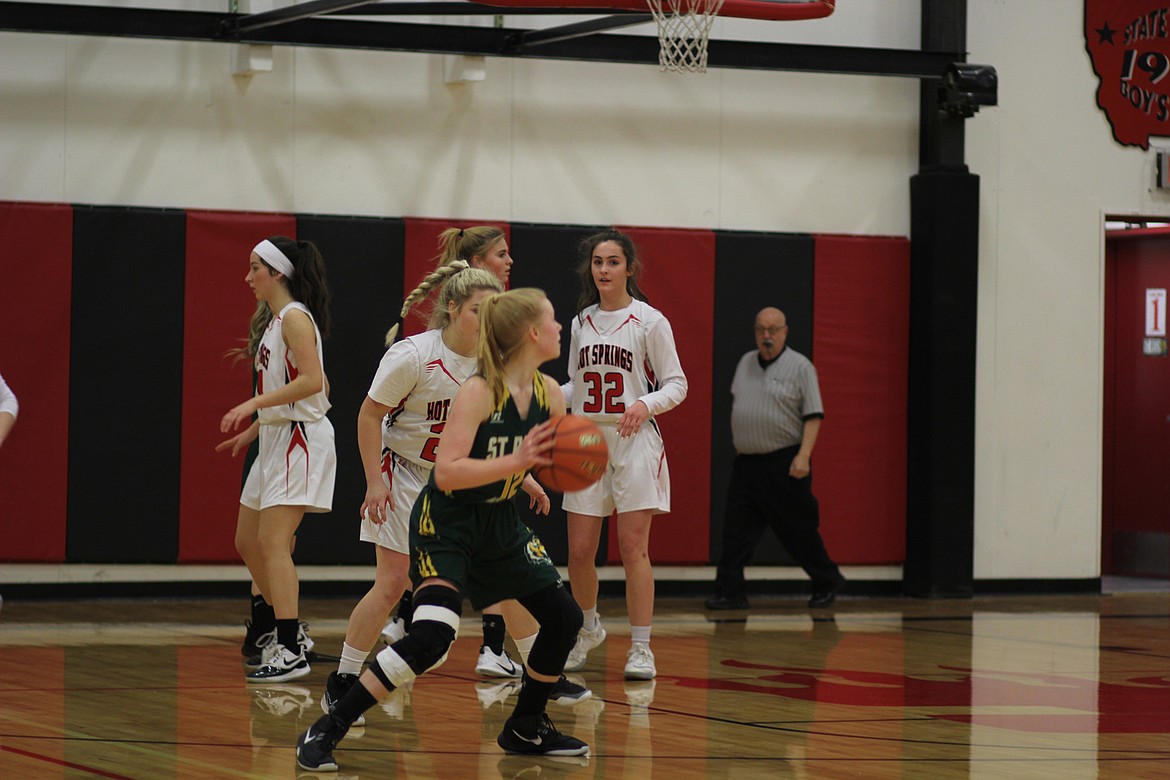 St. Regis freshman Macy Hill looks for an opening against Hot Springs. (Chuck Bandel/Mineral Independent)