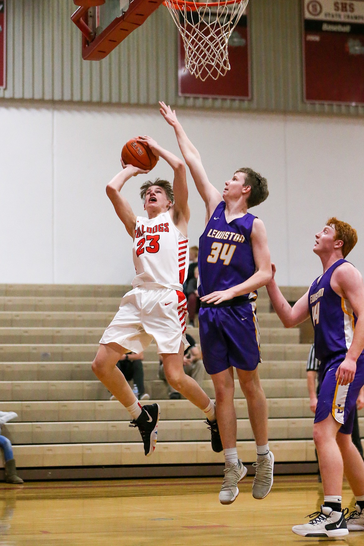 (Photo courtesy of JASON DUCHOW PHOTOGRAPHY)
Freshman Colin Roos goes up for a shot over a Lewiston defender.