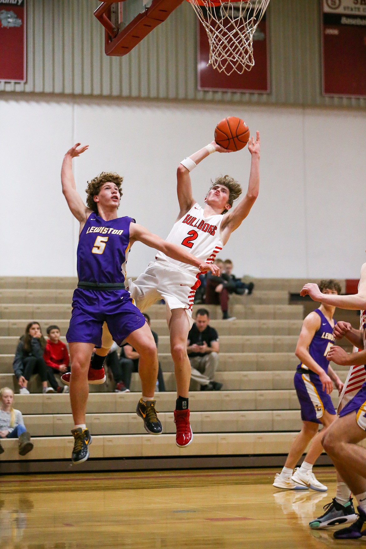 (Photo courtesy of JASON DUCHOW PHOTOGRAPHY)
Senior Kobe Banks tries to hit an off balanced shot Monday night.