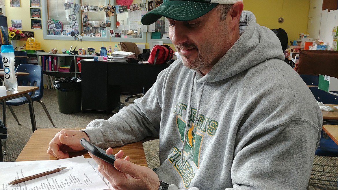 St. Regis High principal Shaun Ball, watches a video on social media issues. (Chuck Bandel/Mineral Independent)