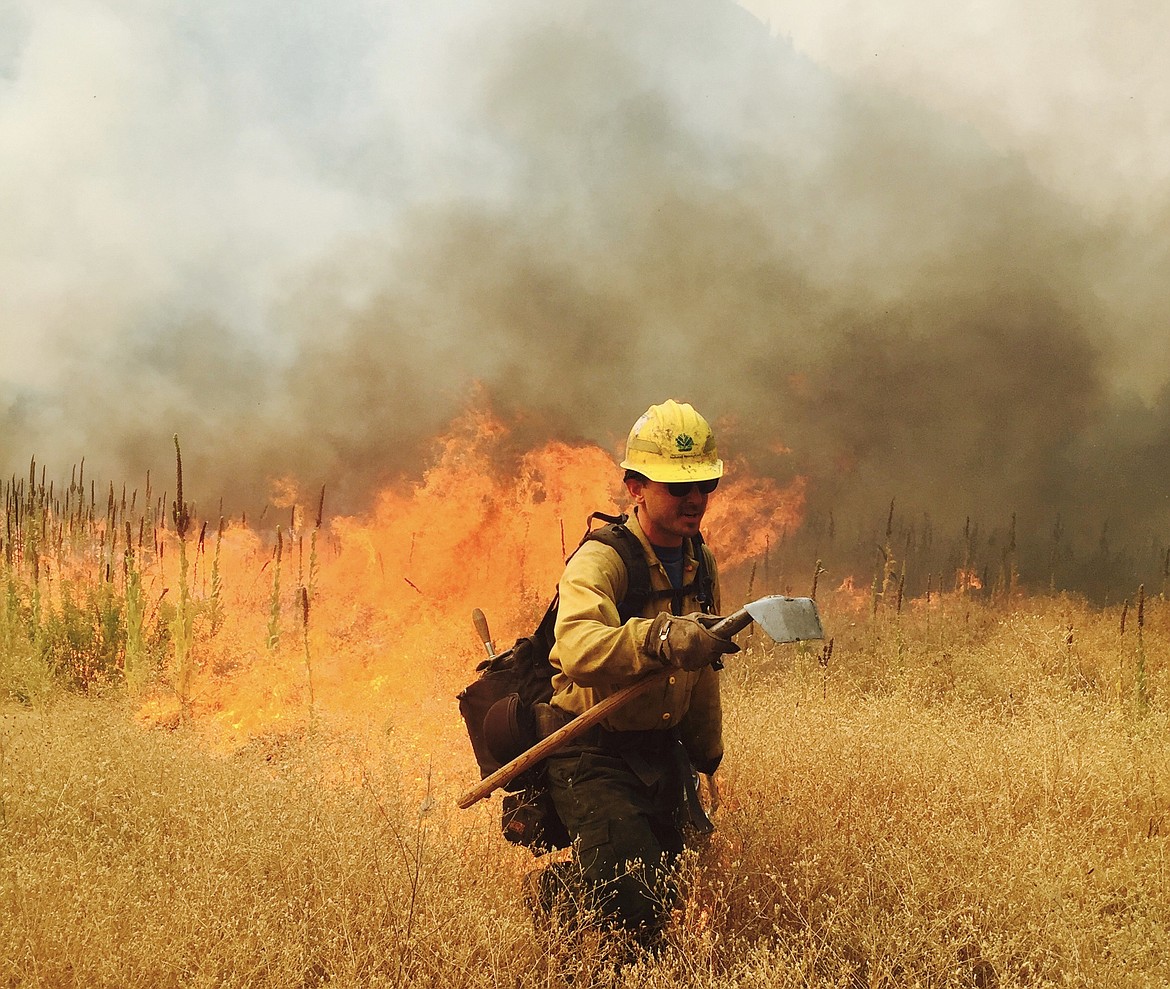 Photo courtesy of Charles Vaught
Charles Vaught explains the state of fire on the ground and in his new book. Vaught will be at the Coeur d&#146;Alene Public Library Saturday February 1st from 10 a.m. to 6 p.m to sign copies of &#147;State of Fire&#148; and entertain with stories about the wildland firefighting experience.