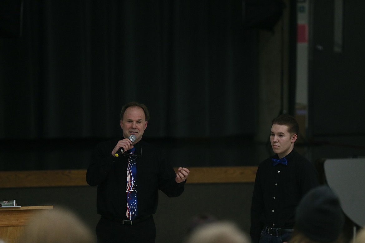 North Idaho STEM Charter Academy principal Scott Thomson introduces senior Ezekial Gehr as he receives the mayor's youth award. Rathdrum Mayor Vic Holmes also gave Lakeland High School senior Erika Gallus the award, celebrating the students' academic and extracurricular achievements. (JENNIFER PASSARO/Press)