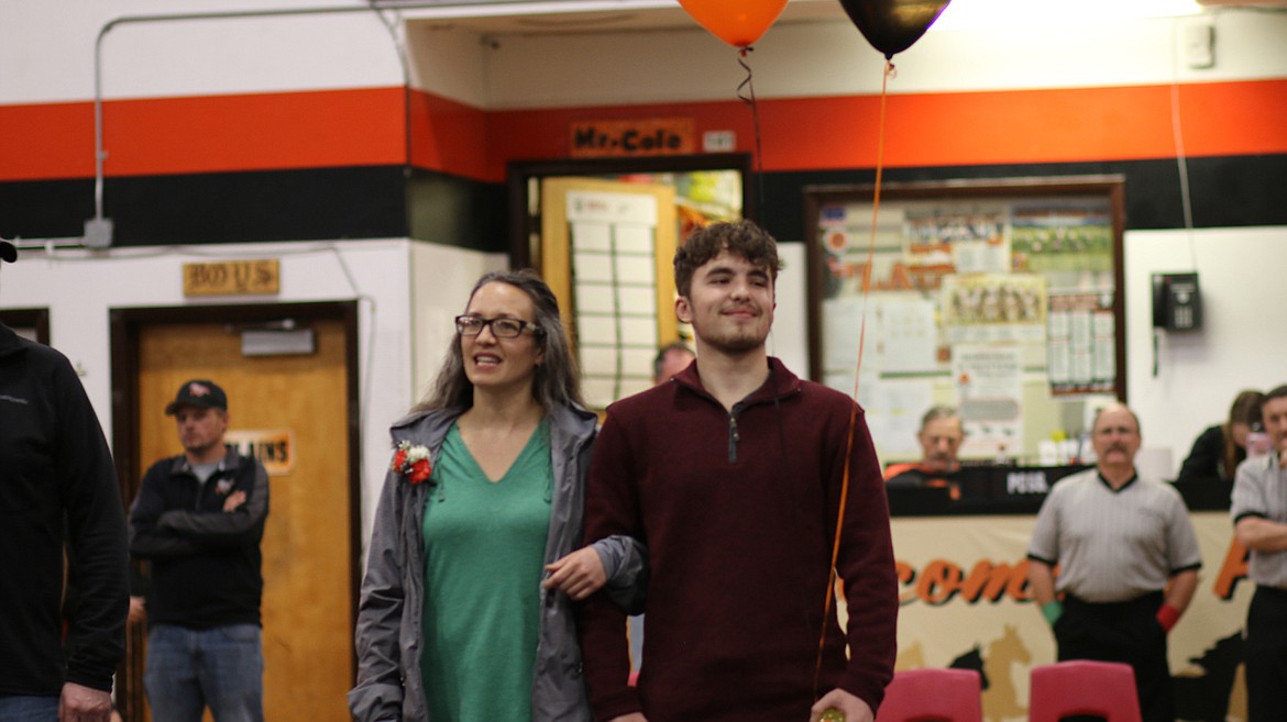 Plains-Hot Springs wrestler Mason Gannarelli with his mother Julie Gannarelli for Plains Senior Night. (Lisa Larson/Valley Press)