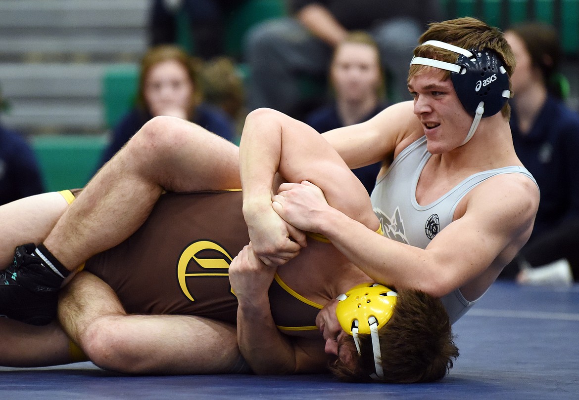 Glacier's Caden Gilmond wrestles Helena Capital's Ian Isaacson at 160 lbs. at Glacier High School on Thursday. Gilmond won by decision. (Casey Kreider/Daily Inter Lake)