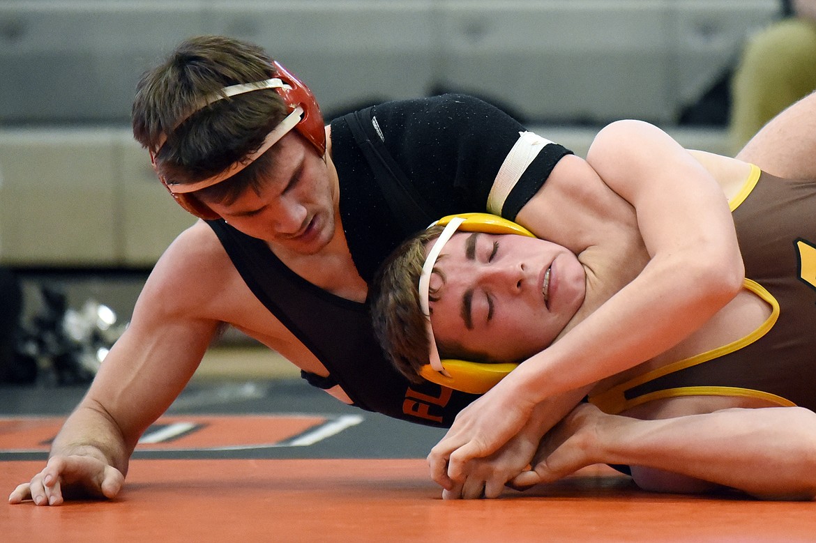 Flathead's Tanner Russell wrestles Helena Capital's Tucker Zanto at 170 lbs. at Flathead High School on Thursday. Russell won by pin. (Casey Kreider/Daily Inter Lake)