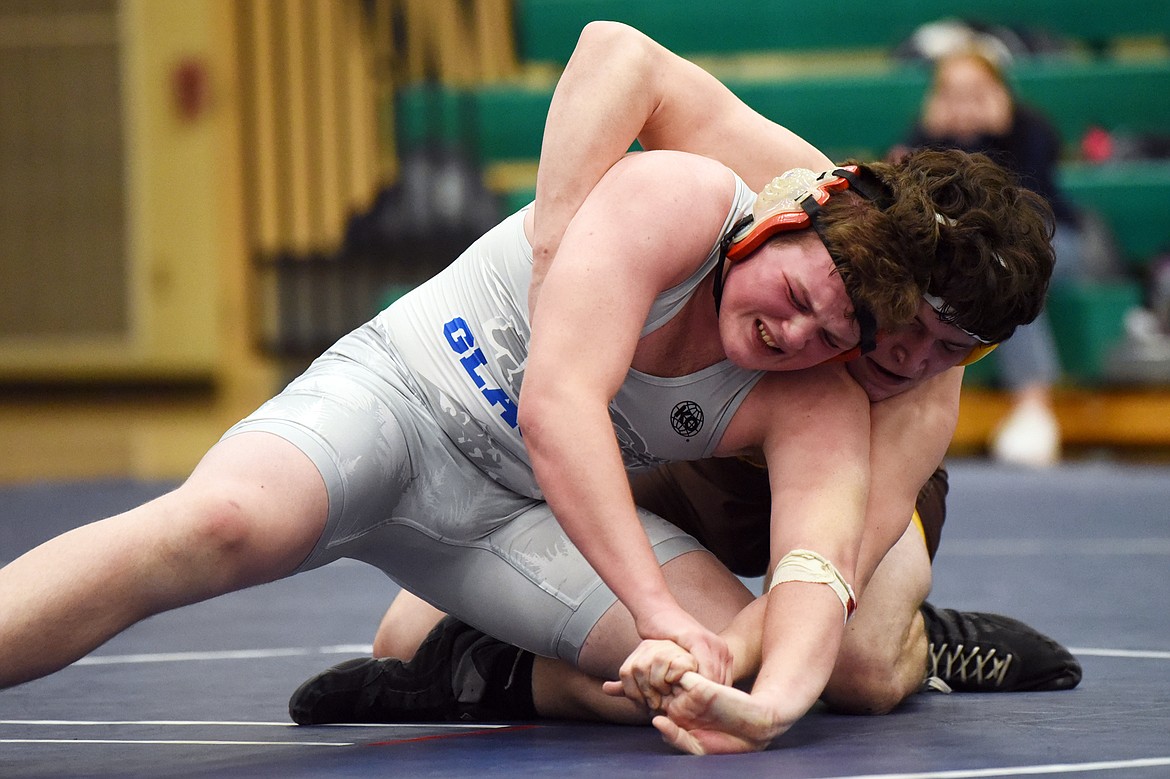 Glacier's Caedon Seymour wrestles Helena Capital's Keaton Pouliot at 205 lbs. at Glacier High School on Thursday. Pouliot won by decision. (Casey Kreider/Daily Inter Lake)