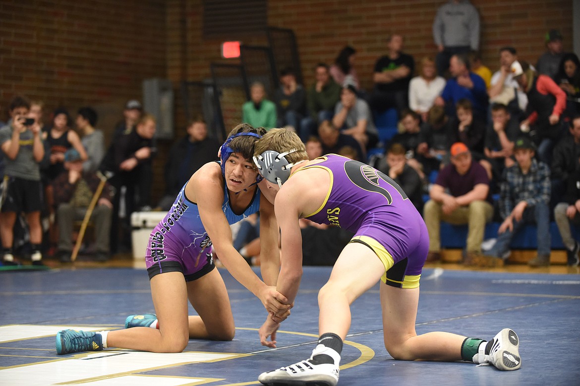 Mission-Charlo's Robert Dempsey tangled with Missoula Sentinel's Trevor Tucker before scoring a third-period pin Saturday at the Ted Kato Invitational in Thompson Falls. (Scott Shindledecker/Lake County Leader)