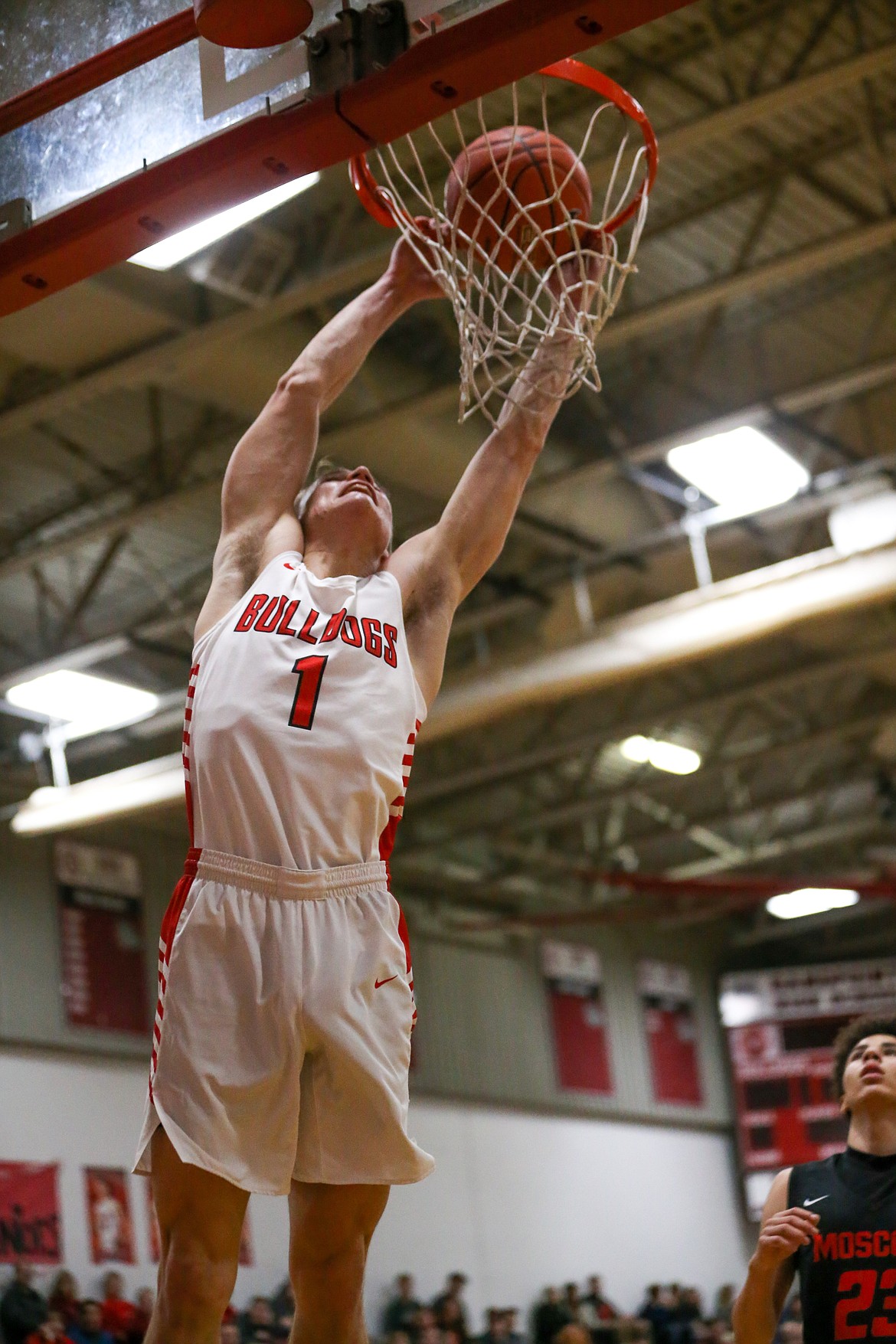 (Photo courtesy of JASON DUCHOW PHOTOGRAPHY)
Senior Ryan Roos rattles the rim with a dunk during the second half of Saturday&#146;s game against Moscow.