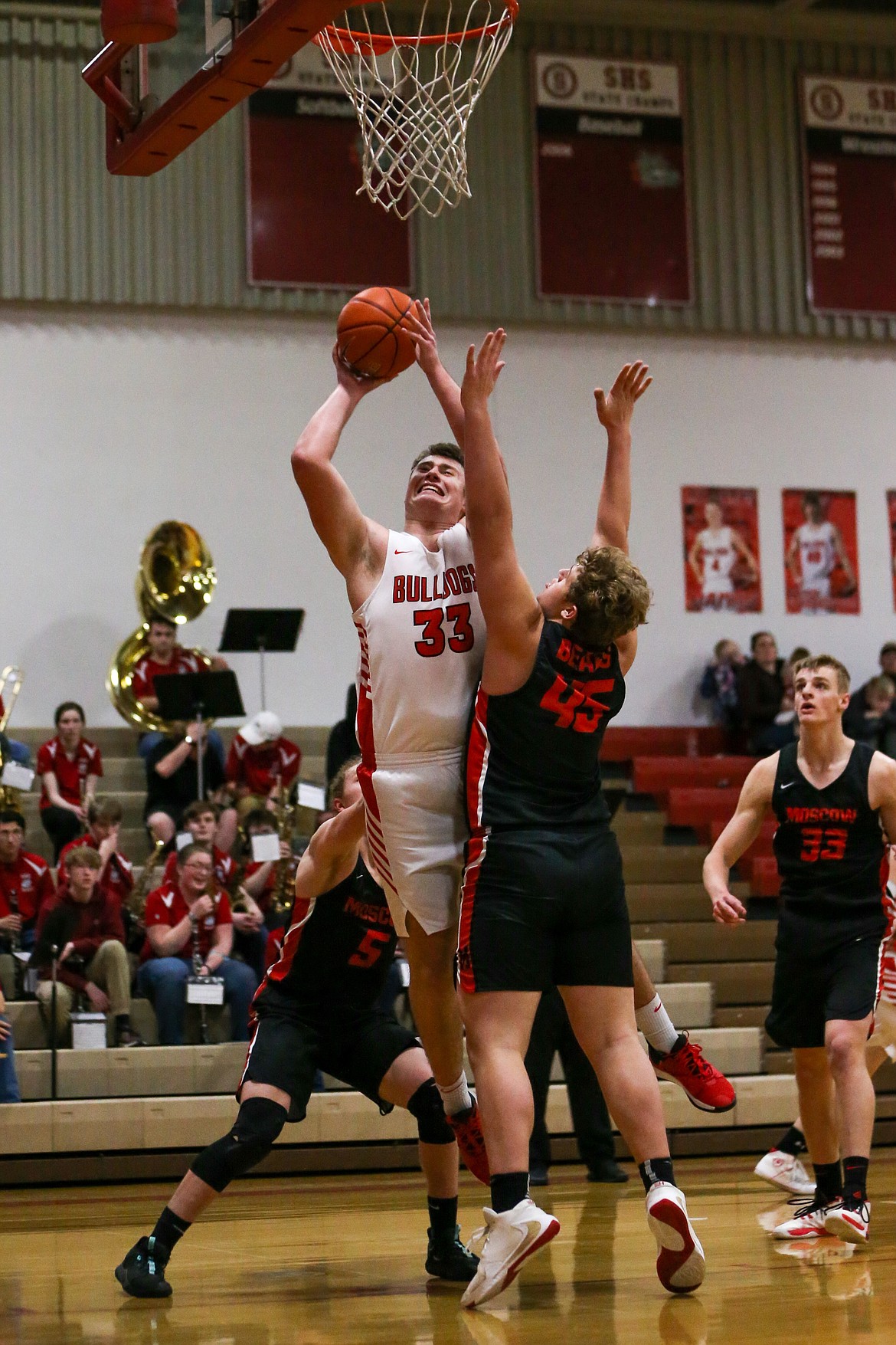 (Photo courtesy of JASON DUCHOW PHOTOGRAPHY)
Senior Brandon Casey fights through contact to put up a shot Saturday at Les Rogers Court.