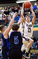 Flathead Valley Home School's Jordan Wininger (23) drives to the hoop against Stillwater Christian at Kalispell Middle School on Saturday. (Casey Kreider/Daily Inter Lake)