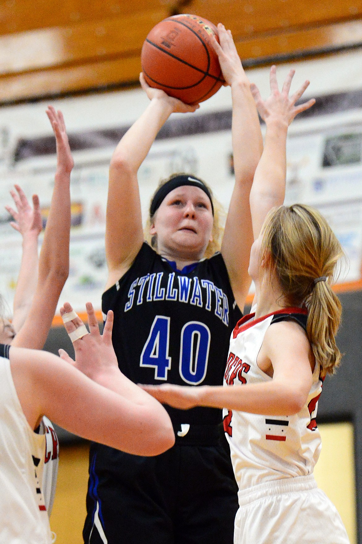 Stillwater Christian's Selah Neumann (40) looks to shoot against Flathead Valley Home School at Kalispell Middle School on Saturday. (Casey Kreider/Daily Inter Lake)