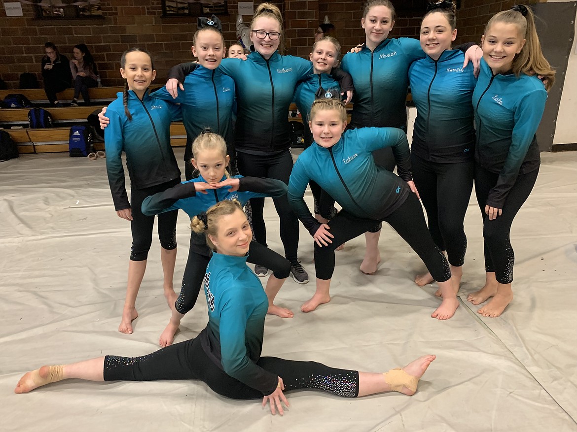 Courtesy photo
Technique Gymnastics Xcel Golds and Platinums at the Palouse Invitational in Moscow Feb. 1-2. In the front is Mikalah Shouse; middle row from left, Libby Huffman; and back row from left, Morgan Rossberg, Lola Jeanselme, coach Bethany Frey, Laila Gilbreath, Moriah Mosqueda, Mackenzie Wyant and Riley Sheets.