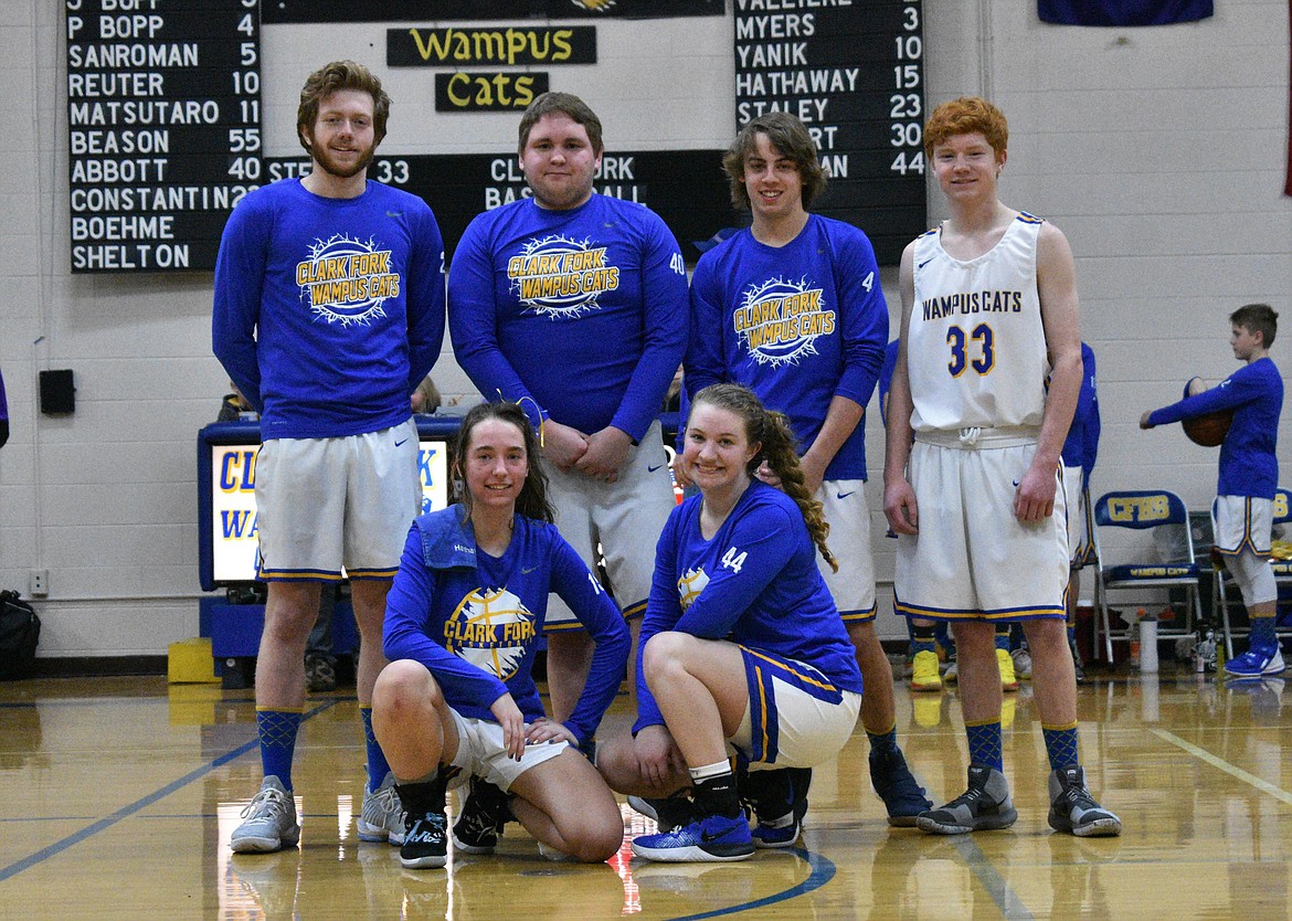 (Photo by DYLAN GREENE)
Clark Fork basketball seniors pose for a group photo during senior night festivities. Front row: Sara Hathaway (left) and Ellie Kiebert. Back row: Josh Constantin (left), Charlie Abbott, Paul Bopp and Isaac Steele.