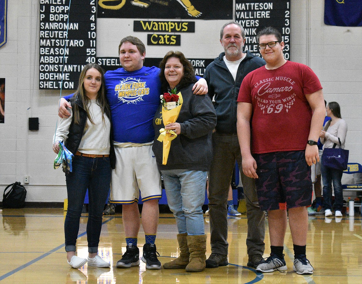 (Photo by DYLAN GREENE)
Senior Charlie Abbott celebrates senior night with his family.