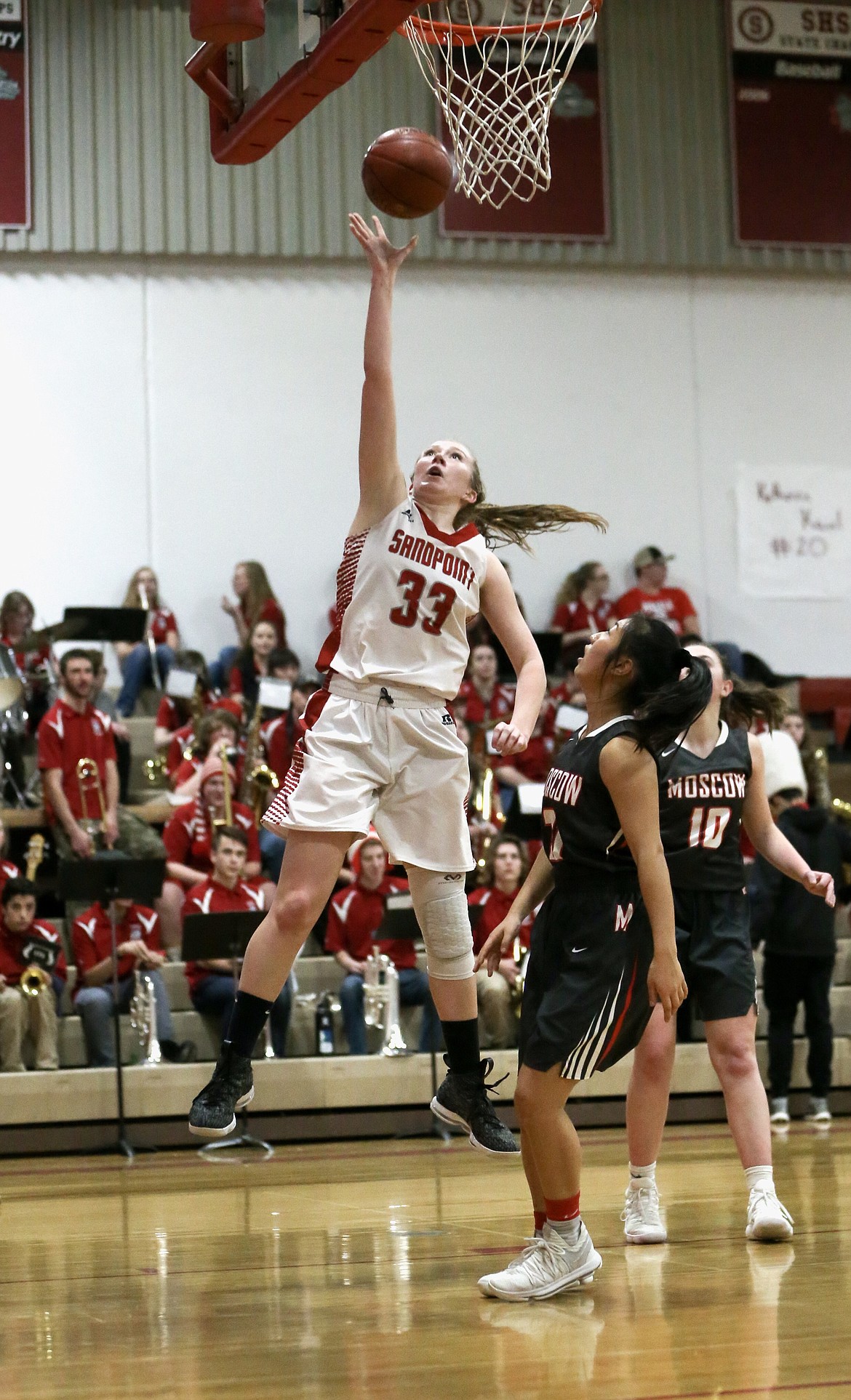 (File photo courtesy of JASON DUCHOW PHOTOGRAPHY)
Then-Sandpoint senior Grace Kirscher goes up for a layup during a game against Moscow on Feb. 1, 2018.