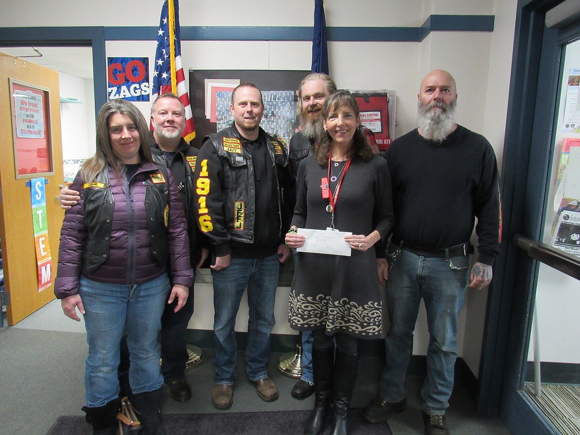 Soul Patrol recently donated $250 in support of Idaho Hill Elementary&#146;s afterschool program. Pictured are members of Soul Patrol with Idaho Hill principal Susie Luckey.

(Courtesy photo)