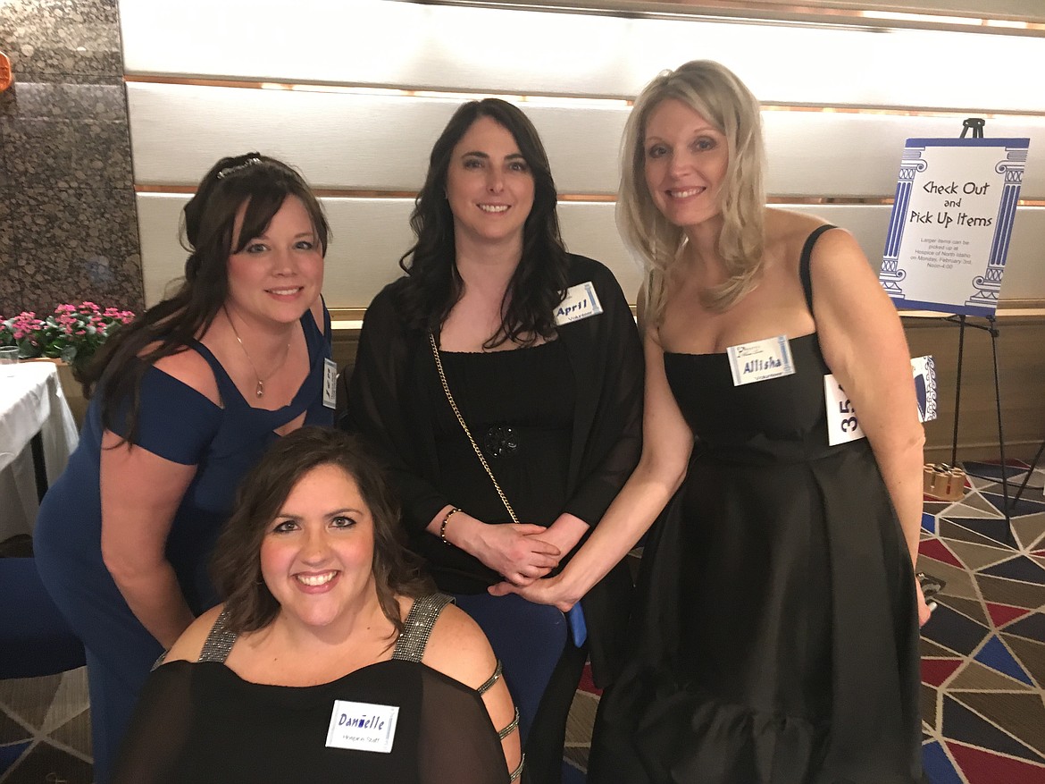 BILL BULEY/Pres
Volunteers and staff with Hospice of North Idaho's 35th annual Hospice Wine Taste enjoy the evening at The Coeur d'Alene Resort. From left are Jennifer Davis, Danielle Craft, April Frandsen and Allisha Rutherford.