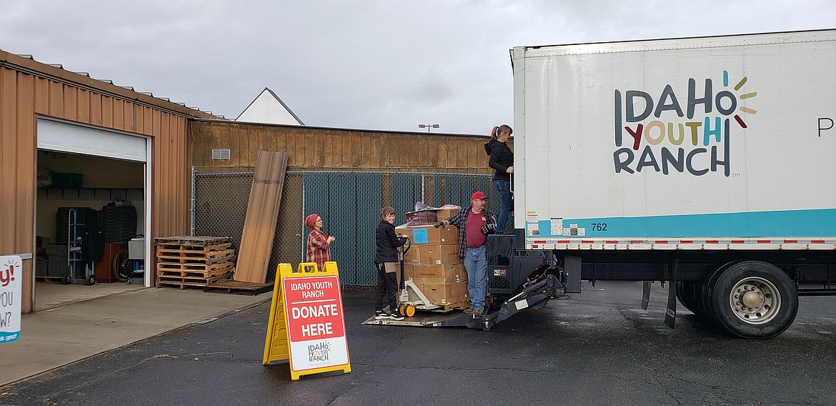 Courtesy photo
From left, Colleen Taylor, Emily Fogerson, Sandy Nolton and Robin Glenn take donations at the new Idaho Youth Ranch store in Post Falls.