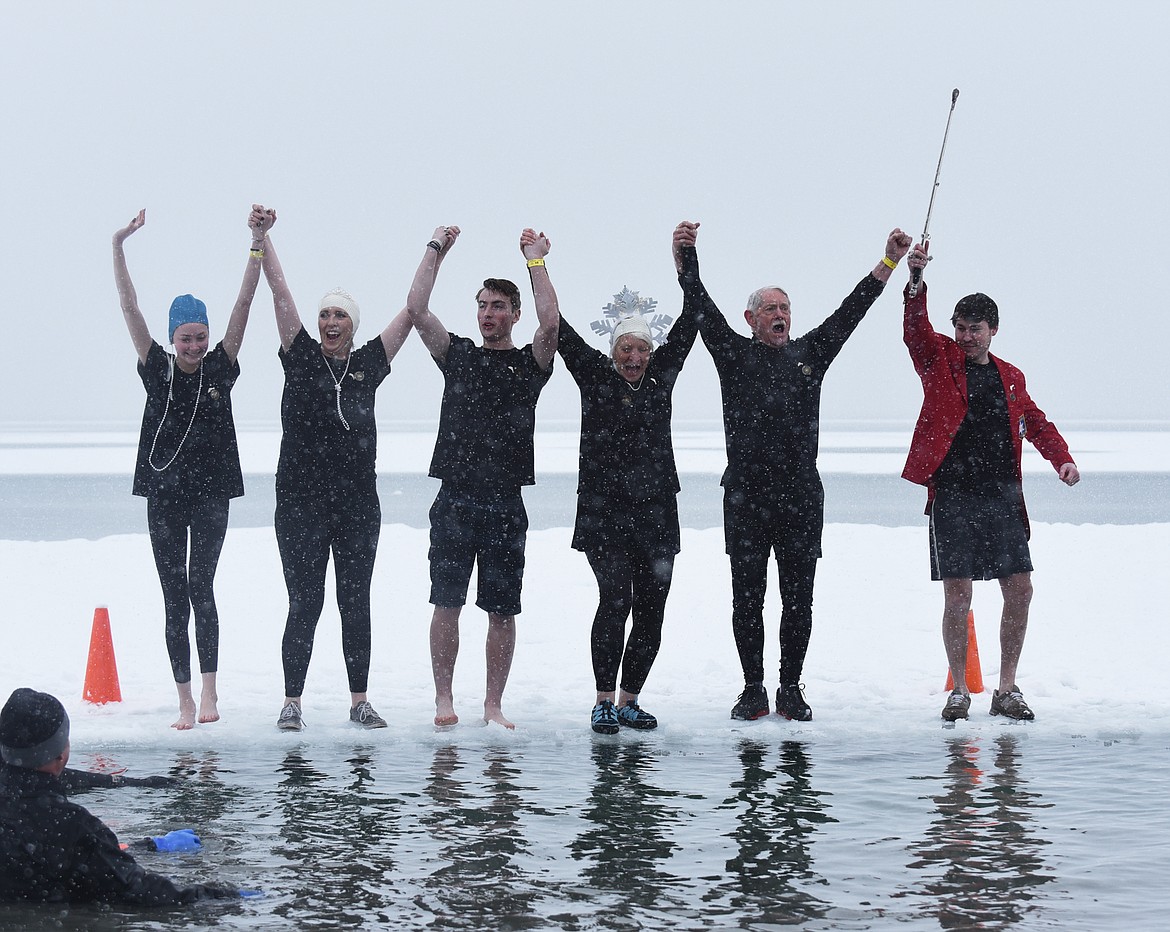 The Whitefish Winter Carnival Royalt gets ready to jump into Whitefish Lake Saturday morning during the annual Penguin Plunge at City Beach. The event raises money for Special Olympics Montana. (Heidi Desch/Whitefish Pilot)