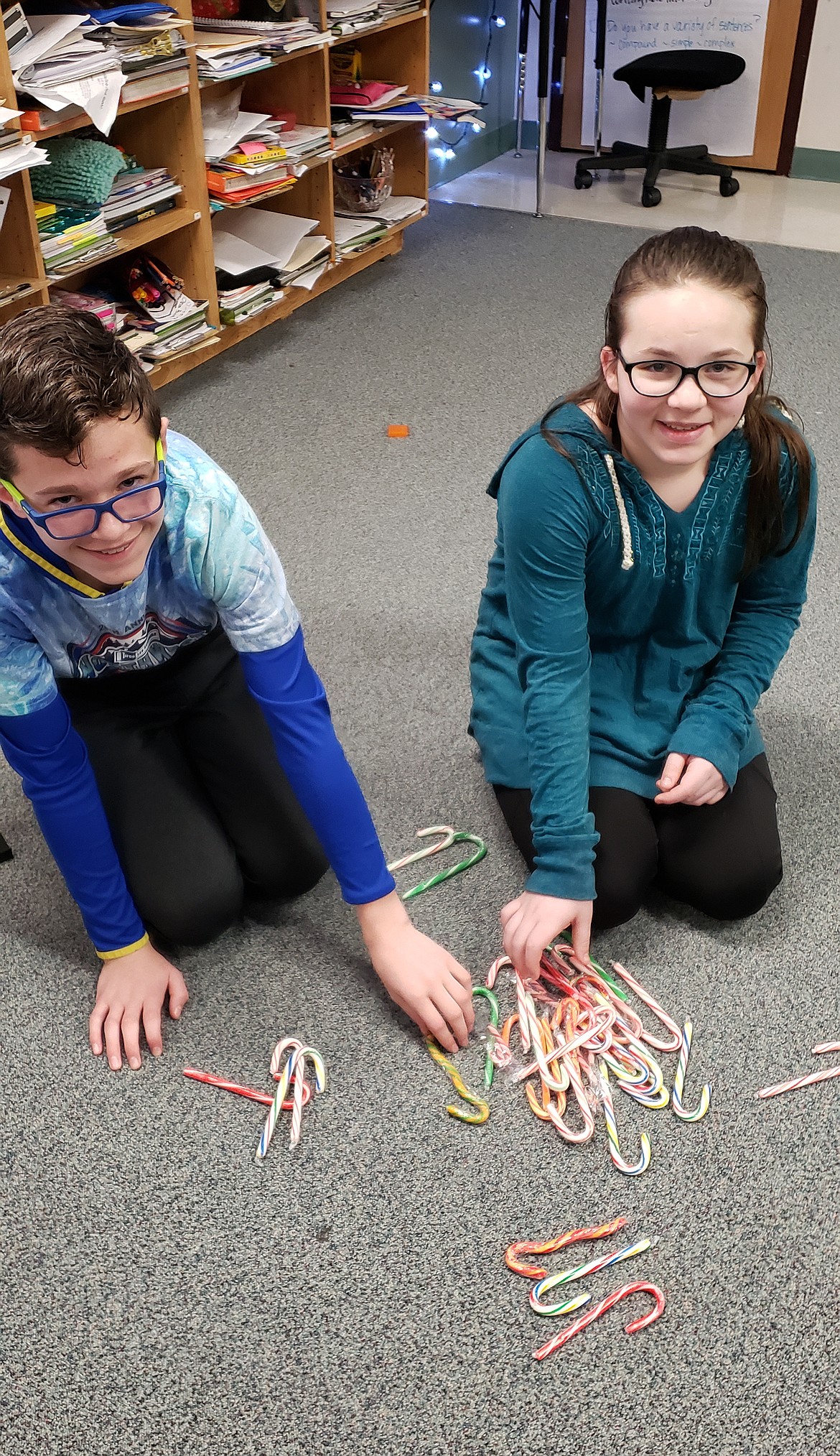 Courtesy photo
Betty Kiefer Elementary fifth-graders Ayden Cragun and Addy Cole count candy canes to raise money for Inland Northwest Honor Flight. The children brought in $1,000 for the nonprofit, which sends local war veterans to see military memorials in Washington, D.C., at no cost.