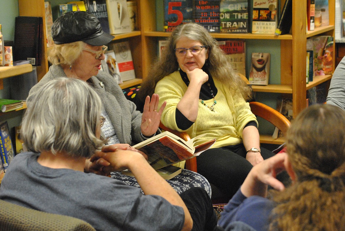 Sharon Kortuem shares about the books she’s read recently during the Bees book club session at the Superior library. (Amy Quinlivan/Mineral Independent)